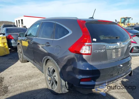 2015 Honda Cr-V Touring z USA, uszkodzony, nr VIN 5J6RM4H98FL129319